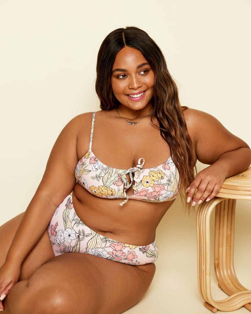 Front of a model wearing a size L Palisades Top in Vintage Bloom by Dippin' Daisy's Swimwear. | dia_product_style_image_id:239623